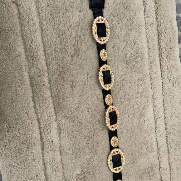 Black belt with gold studs and rhinestones